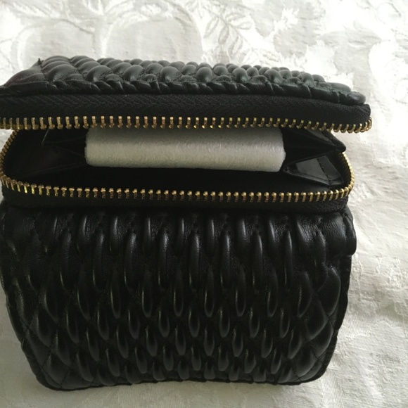 Black multi-use wallet made in Italy.  Padded basketweave pattern. - Picture 5 of 5